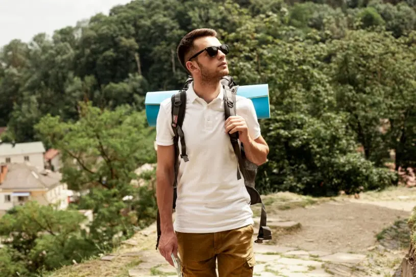 man wearing t shirt on a hike