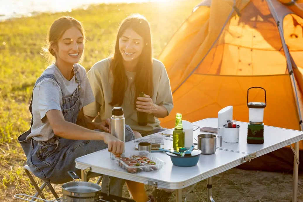 women enjoying a camping