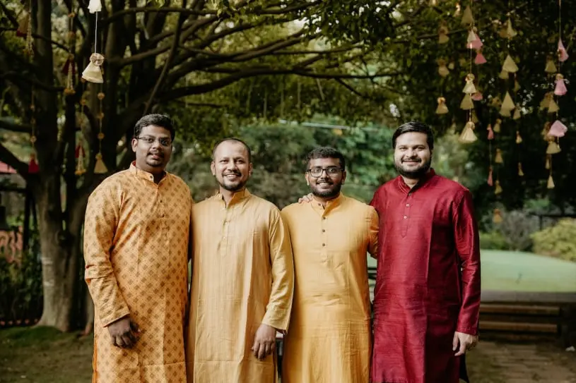men wearing yellow kurtas